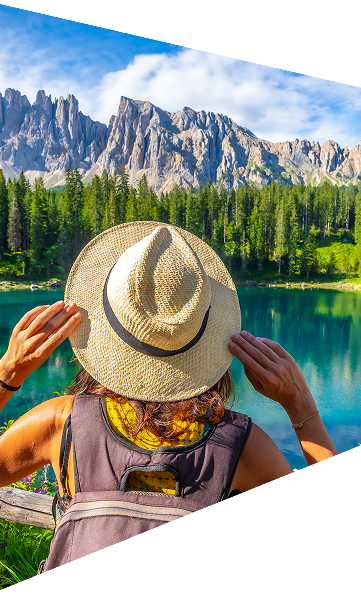 Traveler overlooking a mountain lake